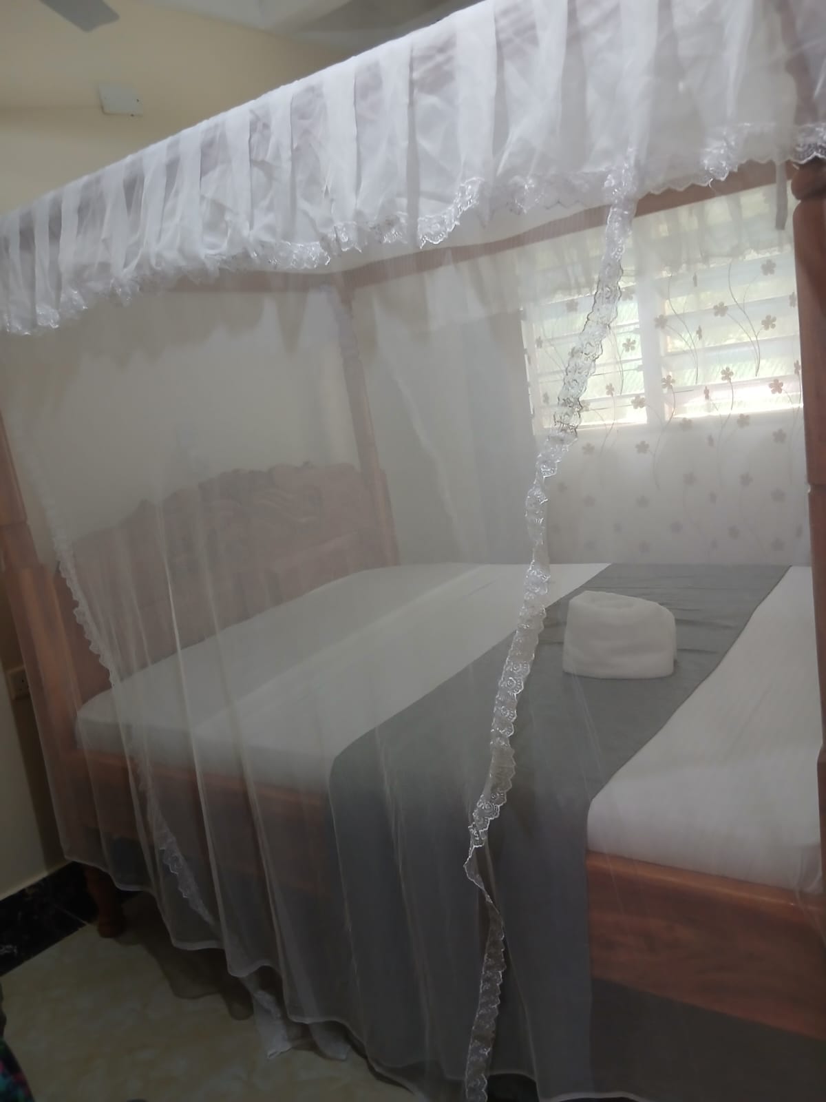 Guest room with mosquito net